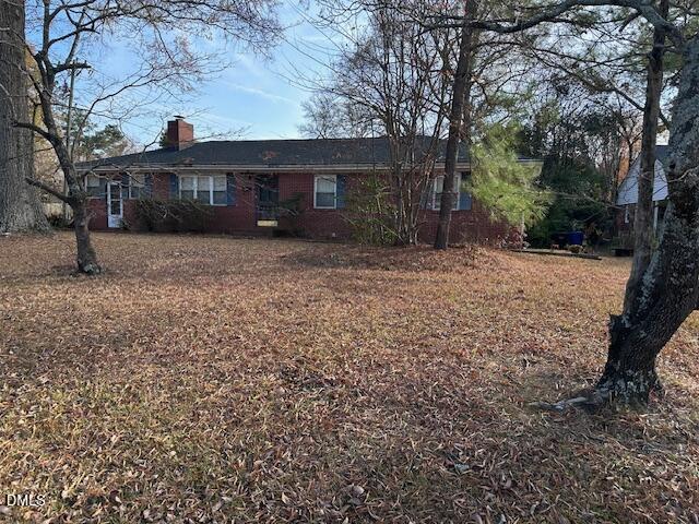 601 Fairfield Road Durham, NC 27704 - Photo 18 of 20 a view of a house with a yard and a tree