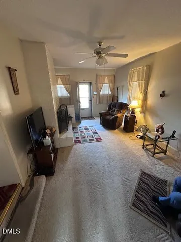 a bed room with furniture and a window