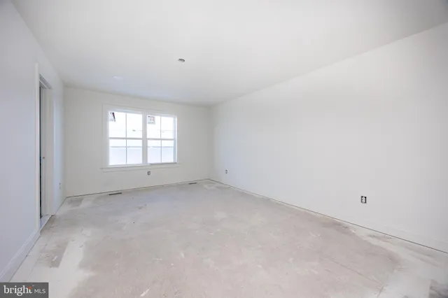 an empty room with a window