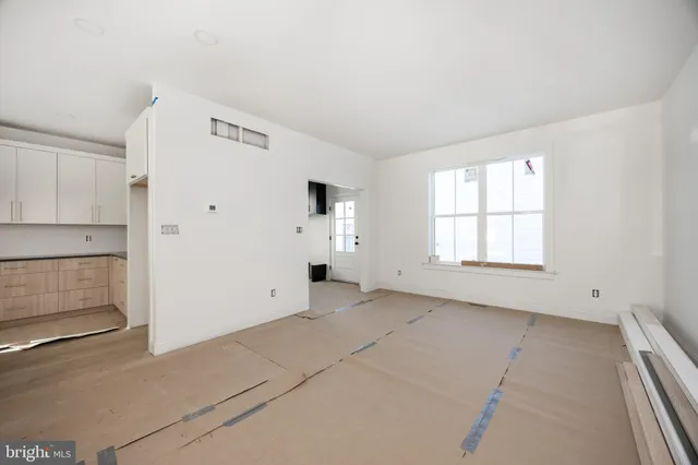 an empty room with windows