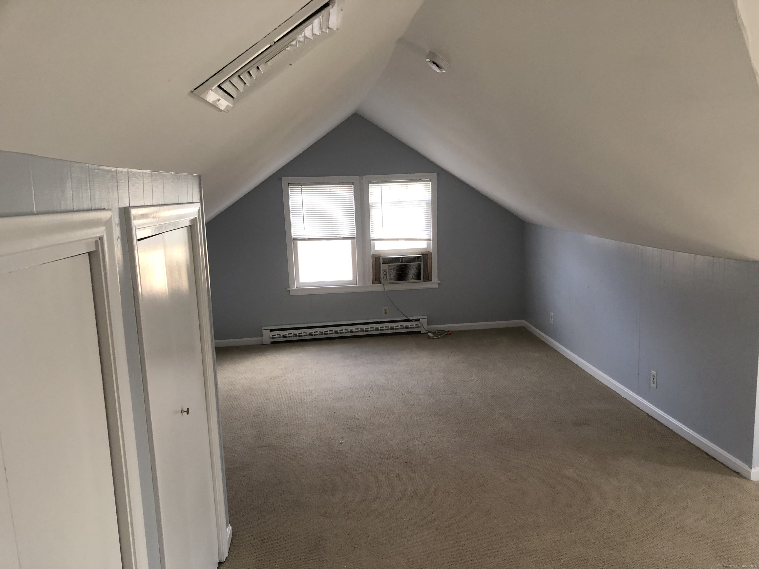 317-319 Garden Street Wethersfield, CT 06109 - Photo 21 of 24 an empty room with windows and closet