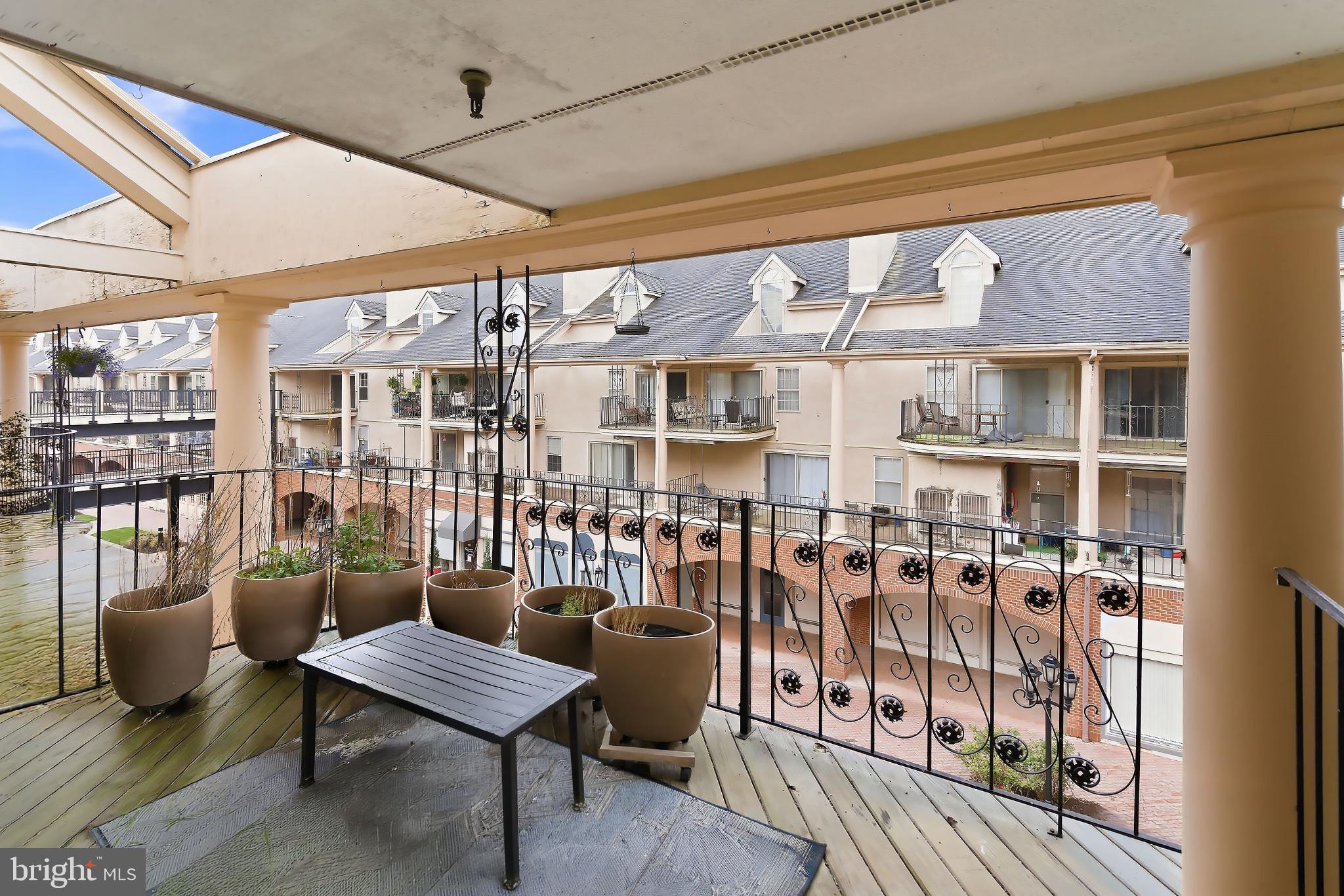 3036 Main Street, Unit 3036 Voorhees, NJ 08043 - Photo 17 of 24 Charming balcony with courtyard views.