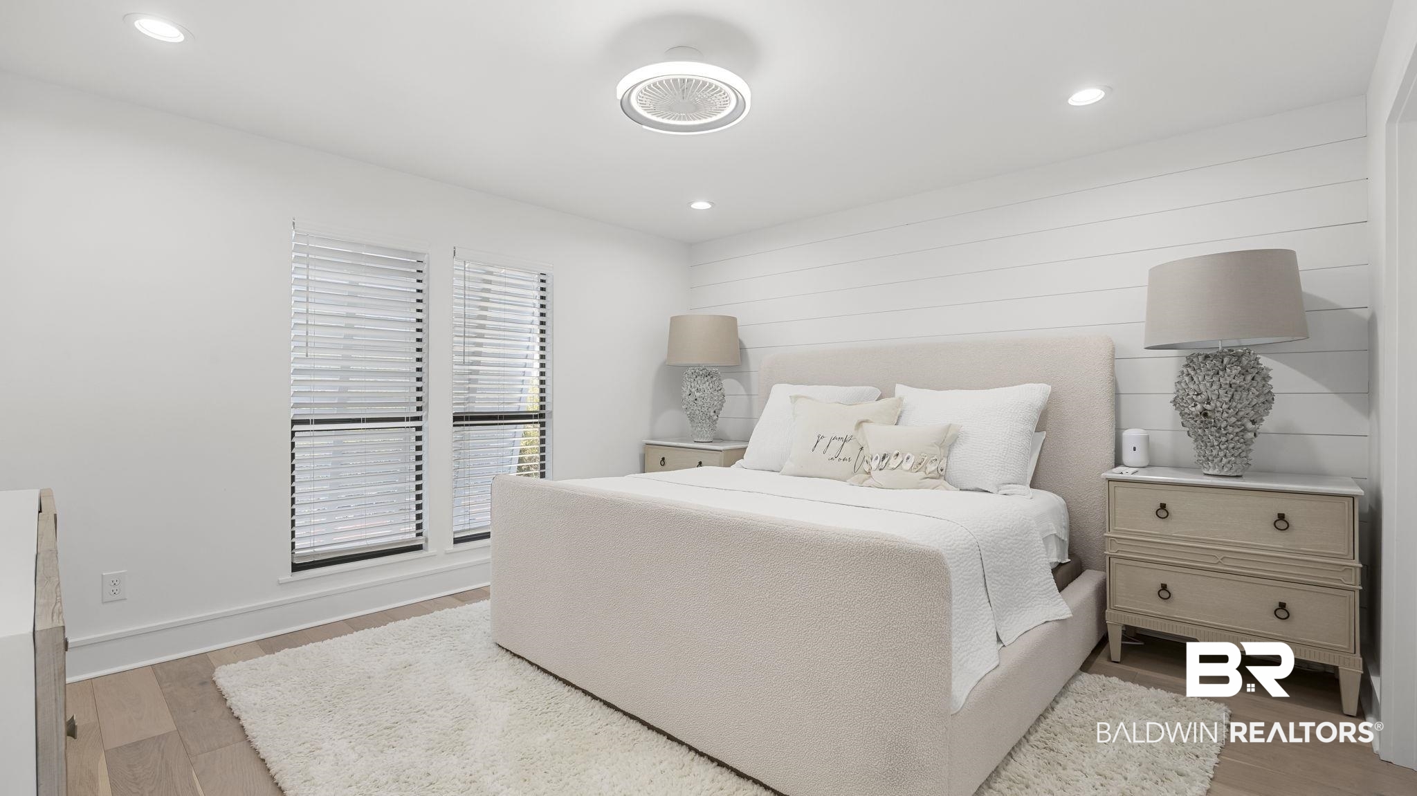 30194 River Road Orange Beach, AL 36561 - Photo 24 of 45 Bedroom featuring light wood-type flooring and recessed lighting