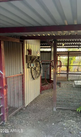 a view of a chair and table in the garden
