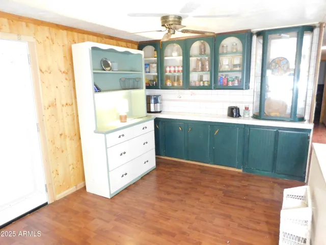 a bathroom with a sink mirror and a bathtub