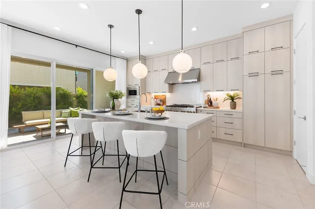 a front view of a house with a yard and a garage