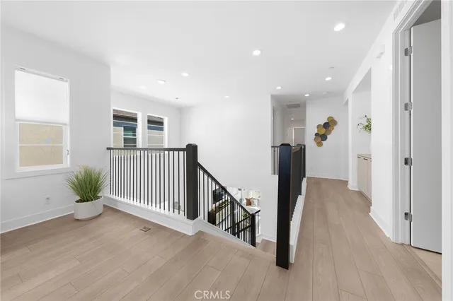 a spacious bedroom with a bed and a couch