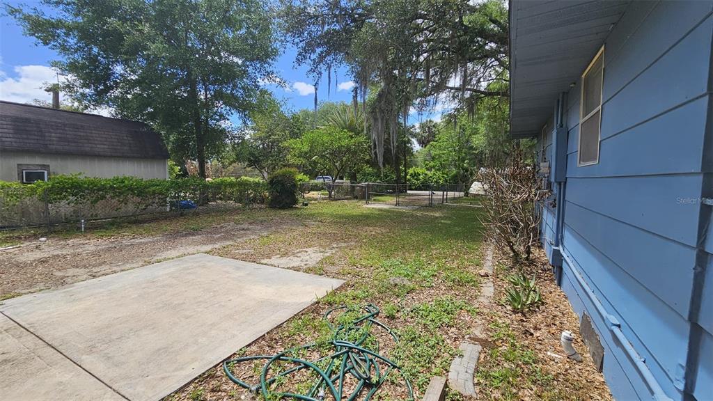 36850 Haynes Road Fruitland Park, FL 34731 - Photo 19 of 28 a view of a backyard