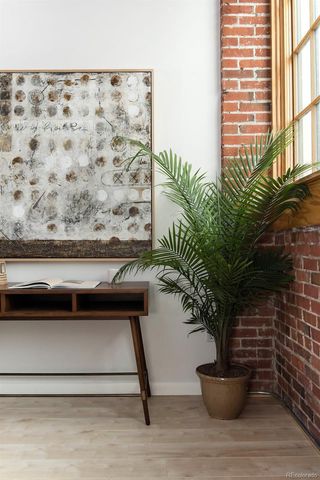 a potted plant sitting on top of a wooden floor