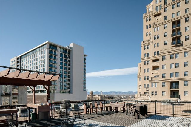 a front view of a building with street view