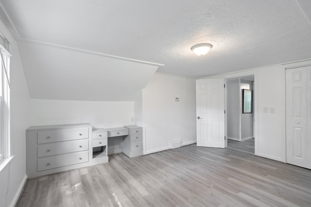 19 Hudson Road Oxford, MA 01540 - Photo 18 of 40 a view of an empty room with wooden floor