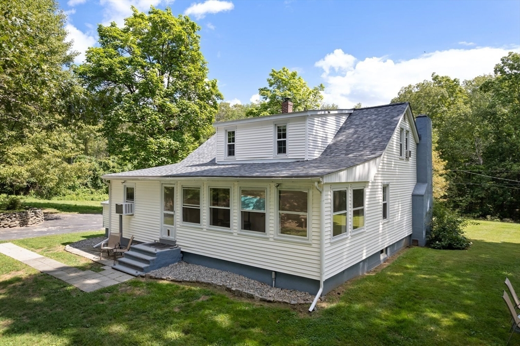 19 Hudson Road Oxford, MA 01540 - Photo 3 of 40 a view of a house with a yard