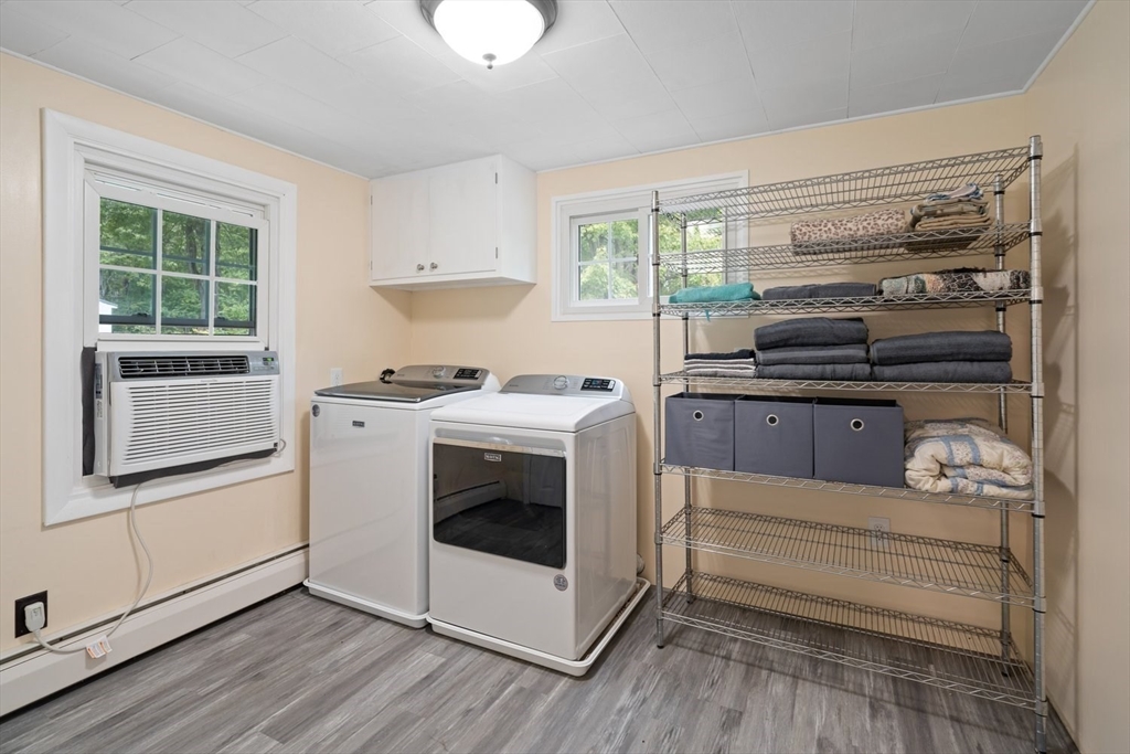 19 Hudson Road Oxford, MA 01540 - Photo 7 of 40 a kitchen with granite countertop a stove and a wooden floors