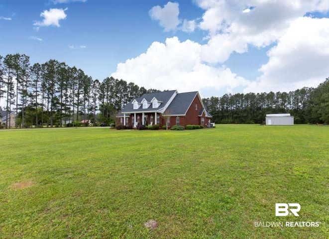24541 Baldwin Beach Expressway Robertsdale, AL 36567 - Photo 3 of 51 View of yard