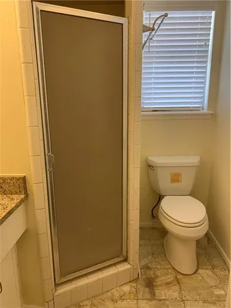 a bathroom with a sink and a toilet