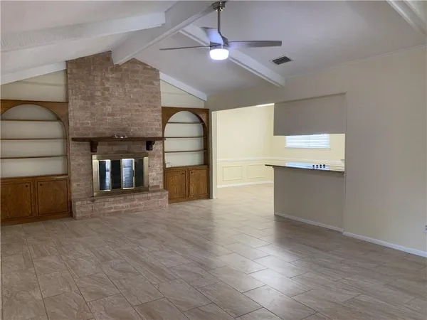 a view of a livingroom with a fireplace