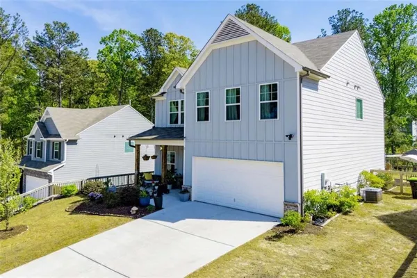 a view of house with outdoor space