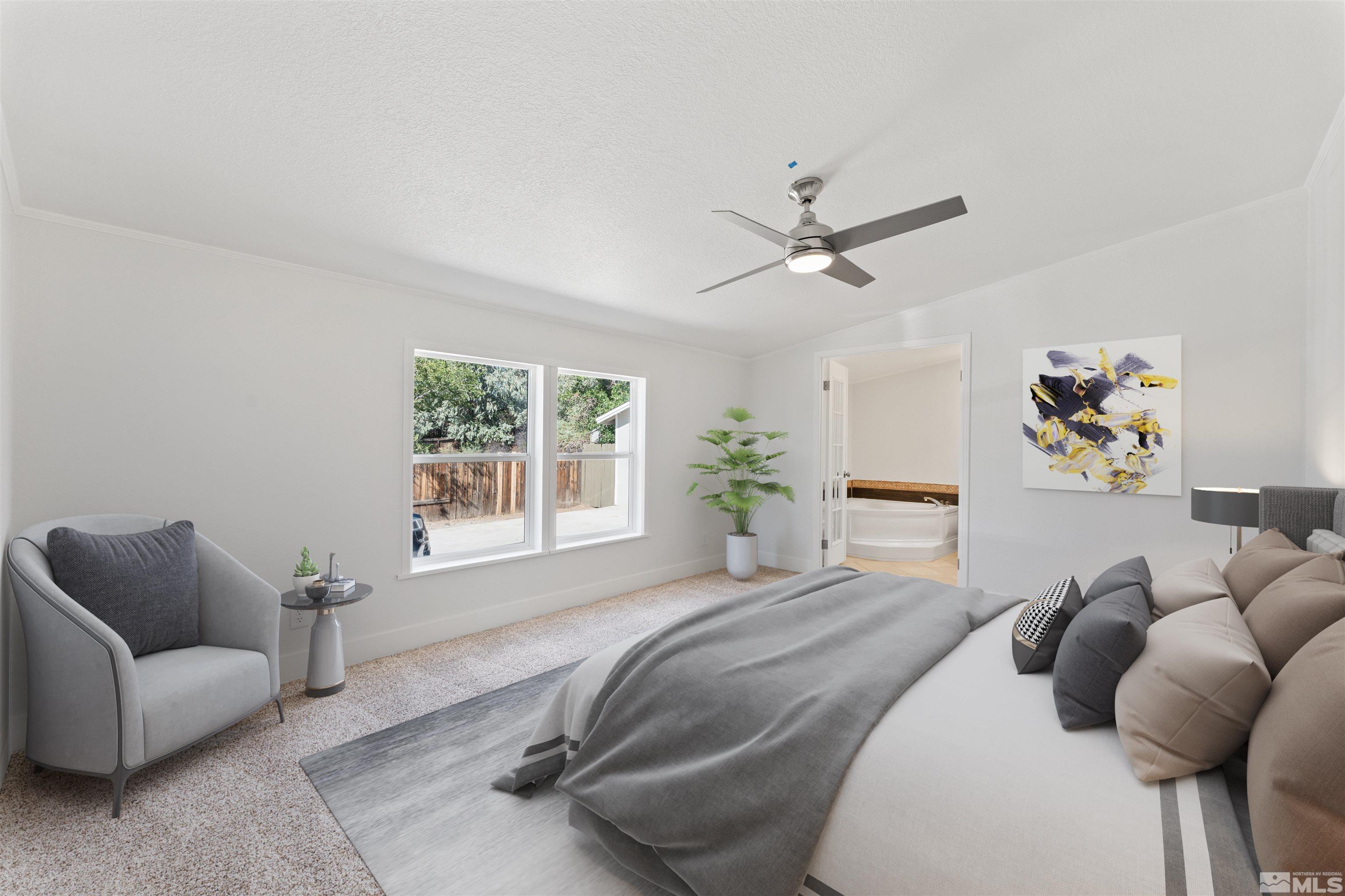 7640 Lytton Road Reno, NV 89506 - Photo 17 of 40 a bedroom with furniture and a large window