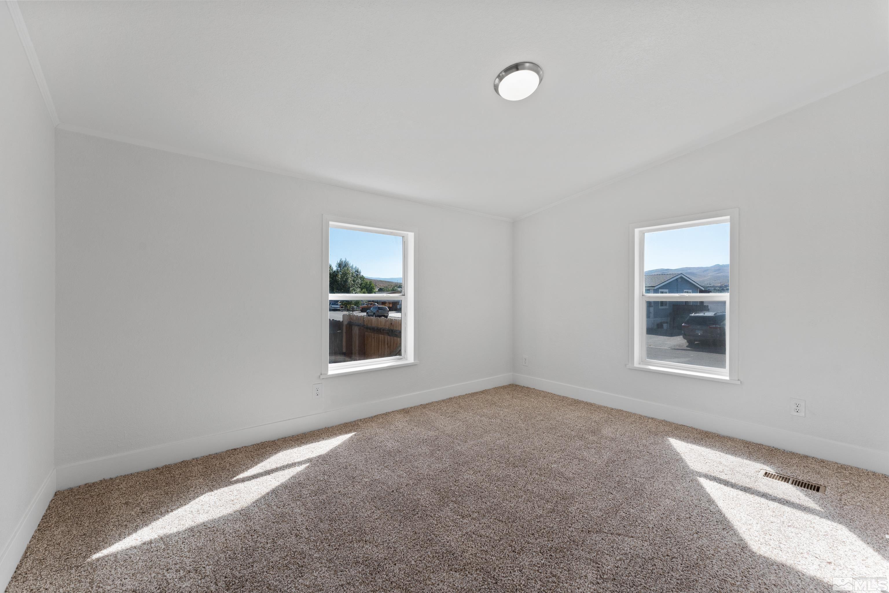 7640 Lytton Road Reno, NV 89506 - Photo 27 of 40 an empty room with a window