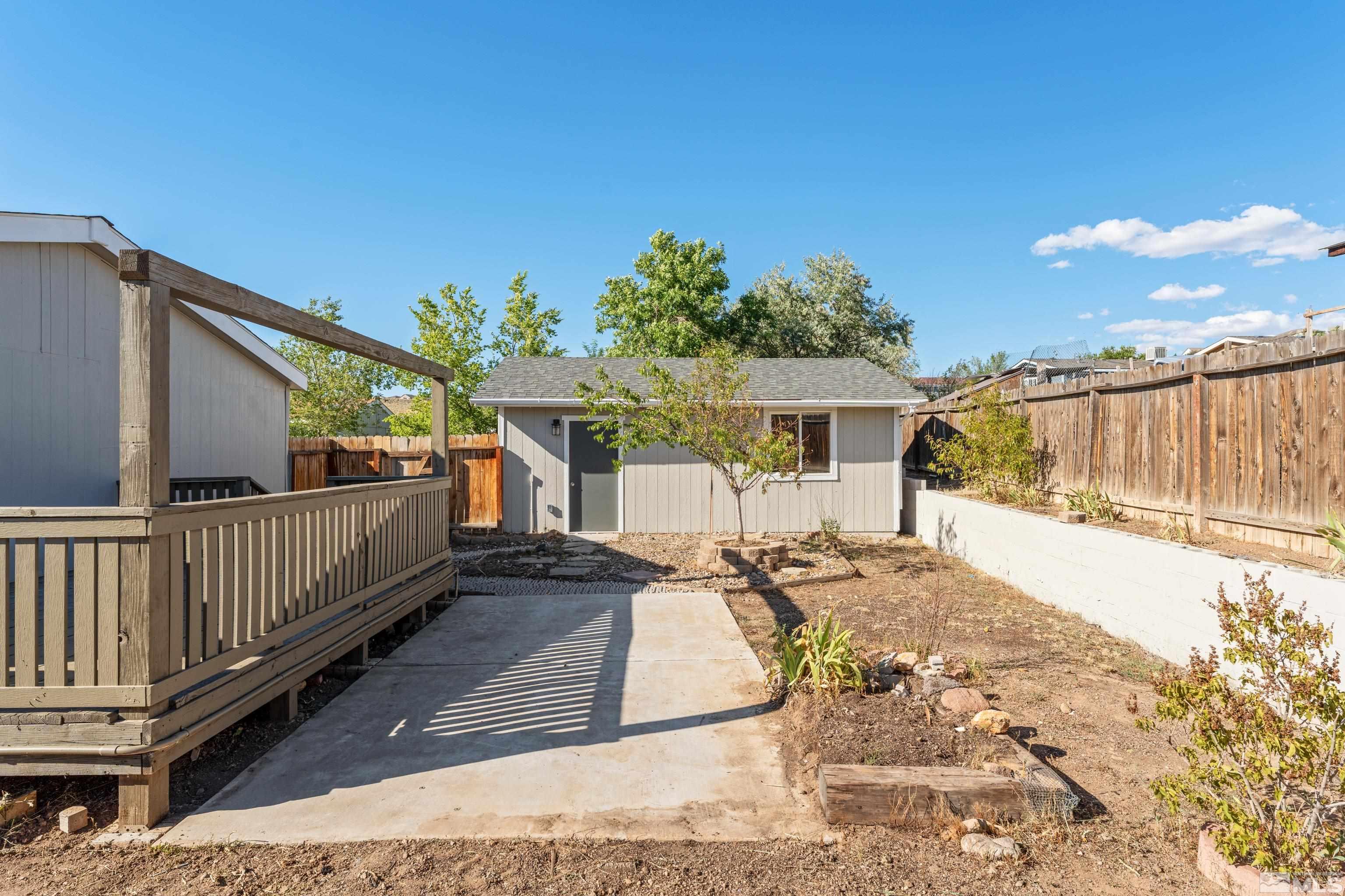 7640 Lytton Road Reno, NV 89506 - Photo 37 of 40 a view of a house with backyard and sitting area