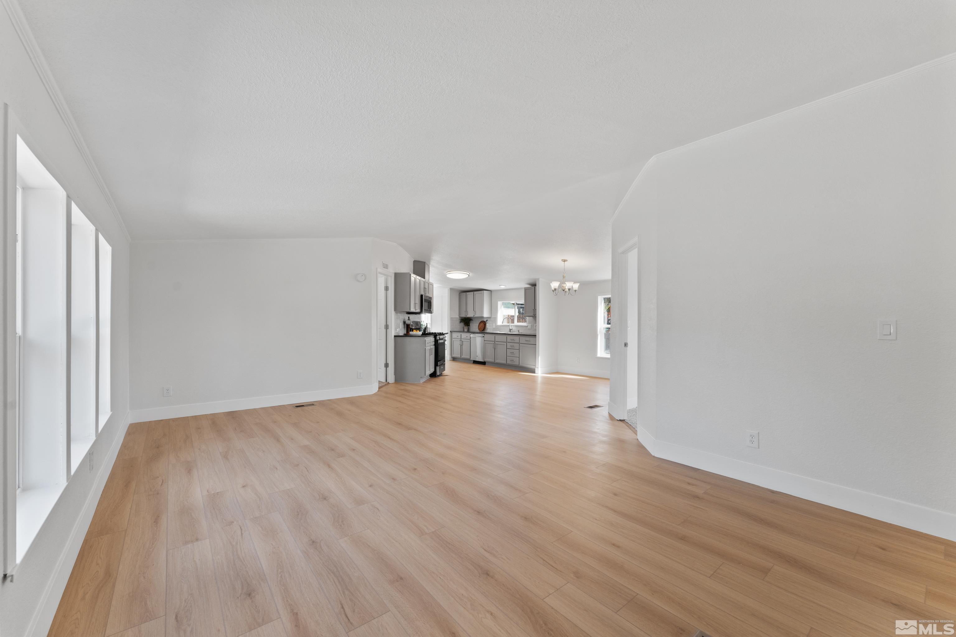 7640 Lytton Road Reno, NV 89506 - Photo 9 of 40 a view of a room with wooden floor
