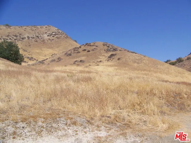 a view of a lake with mountains in the background