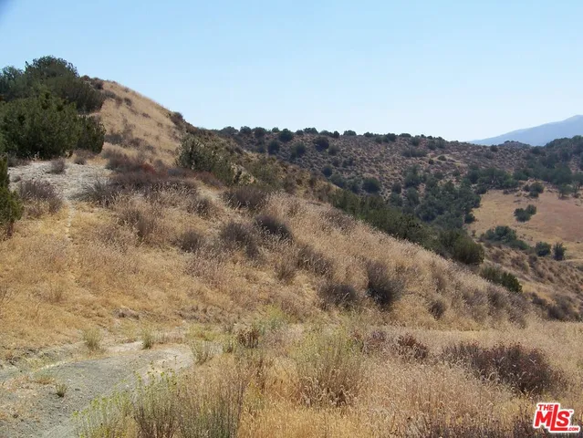 a view of mountain and a mountain