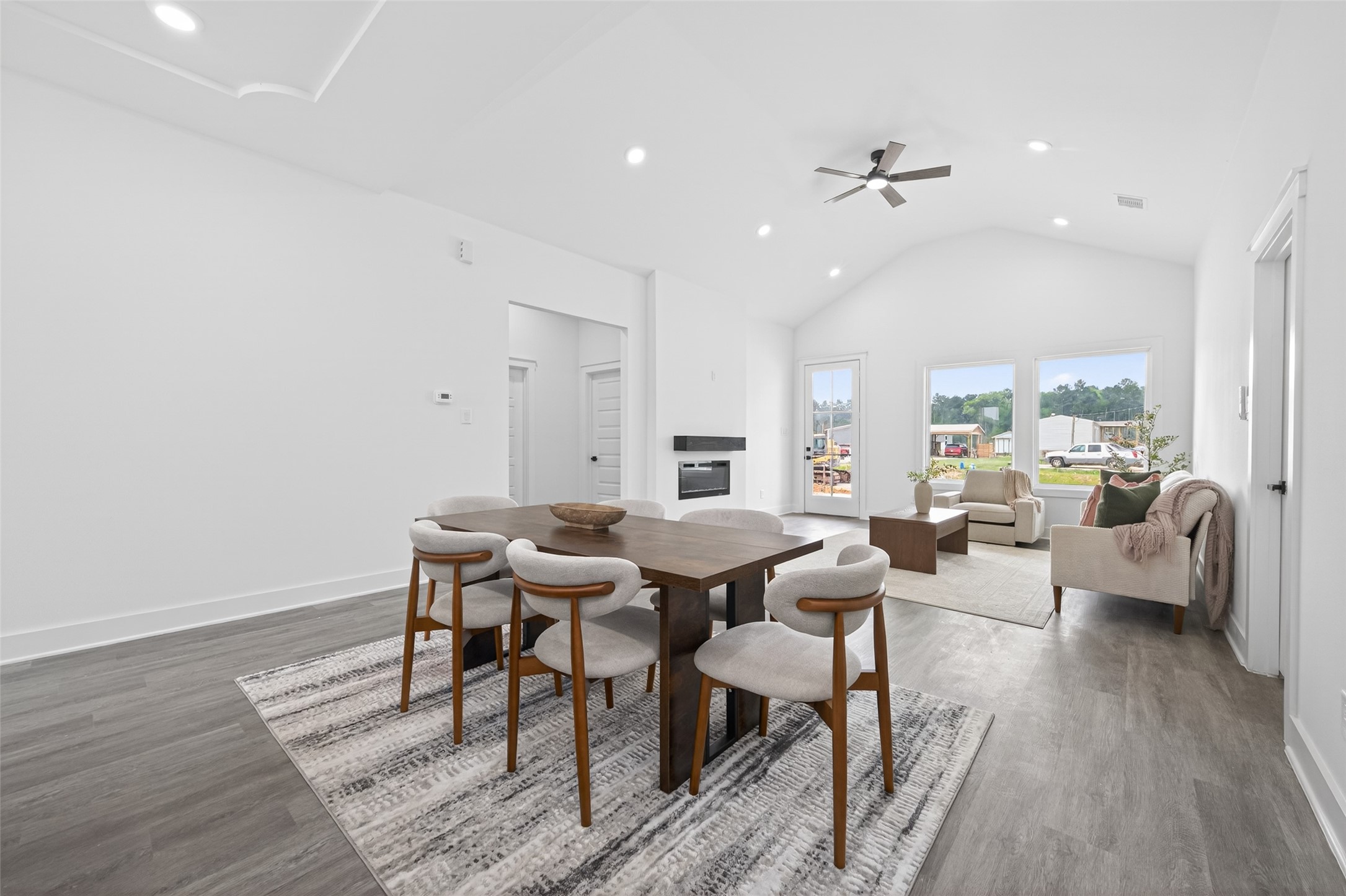 1129 Longleaf Pne Street Huffman, TX 77336 - Photo 15 of 35 a view of a dining room with furniture window and wooden floor