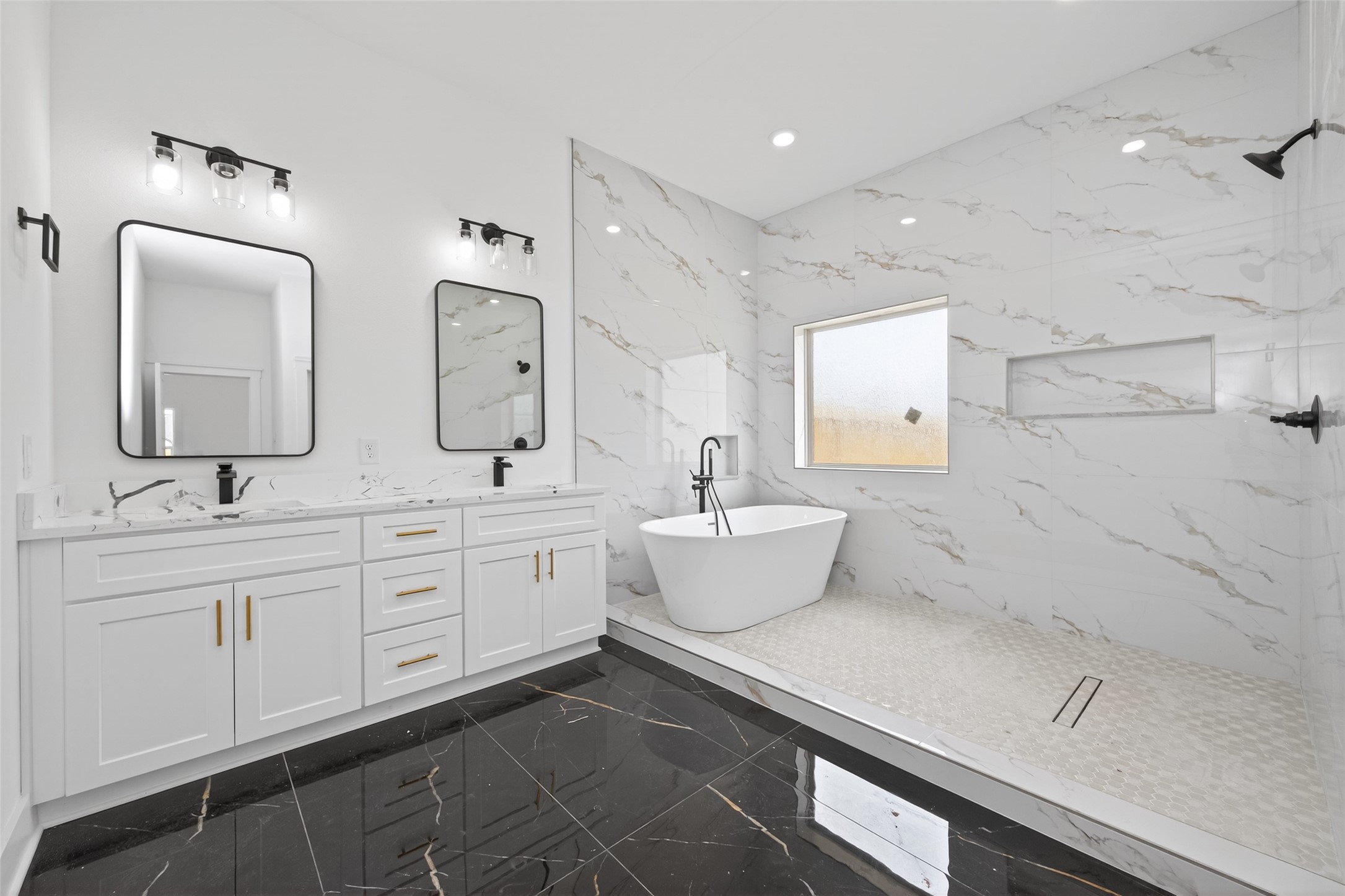 1129 Longleaf Pne Street Huffman, TX 77336 - Photo 18 of 35 a large bathroom with double vanity sink a mirror and a bathtub