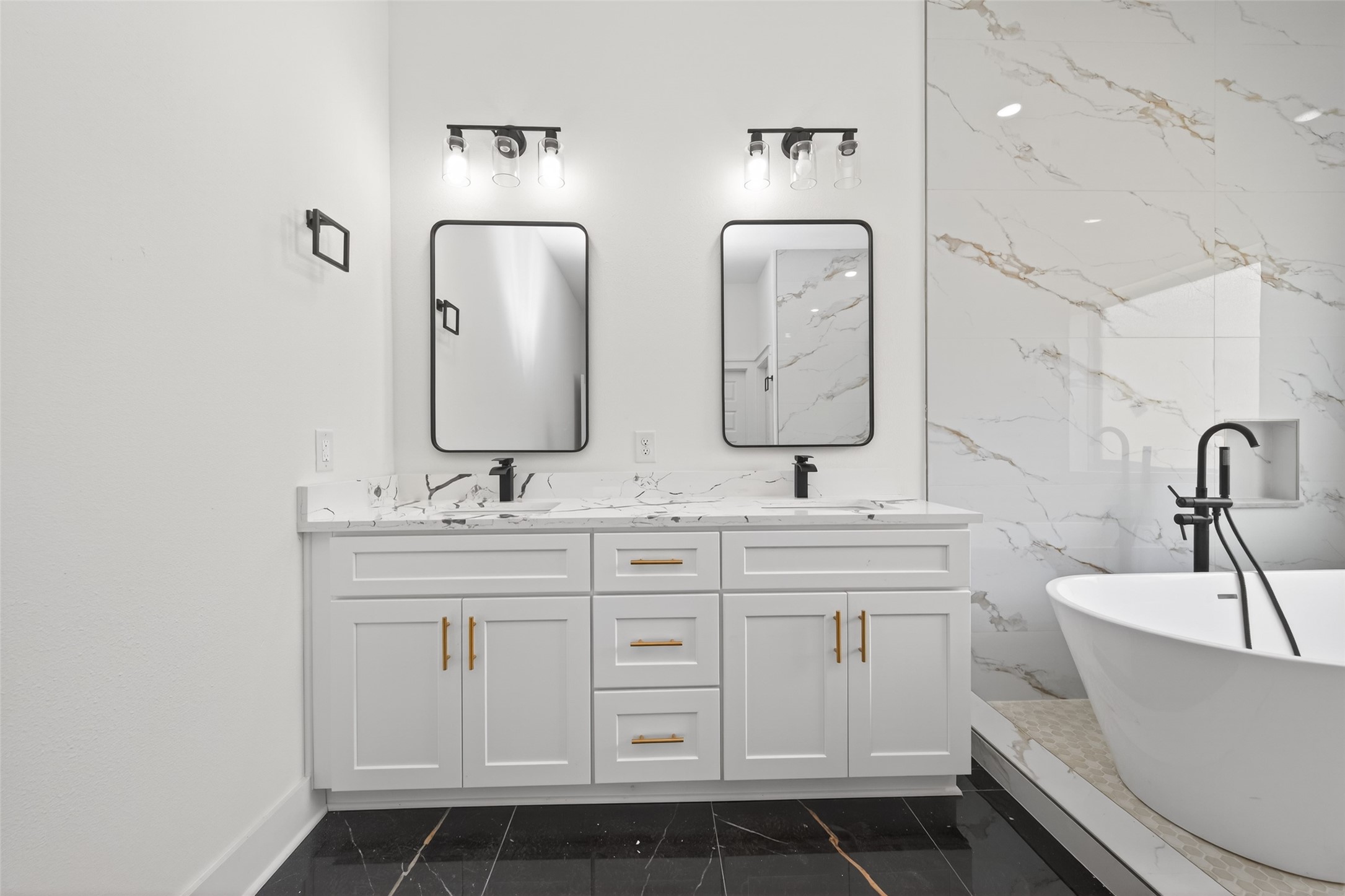1129 Longleaf Pne Street Huffman, TX 77336 - Photo 20 of 35 a bathroom with double vanity two mirror and a toilet