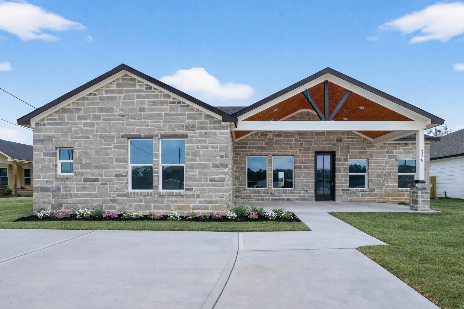 1129 Longleaf Pne Street Huffman, TX 77336 - Photo 2 of 35 a front view of a house with yard