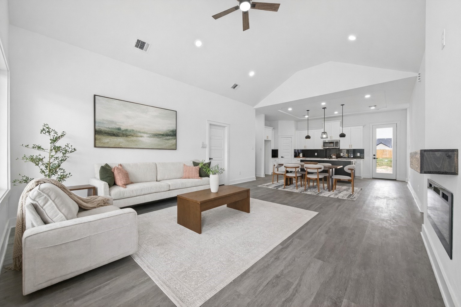 1129 Longleaf Pne Street Huffman, TX 77336 - Photo 4 of 35 a living room with furniture and a wooden floor