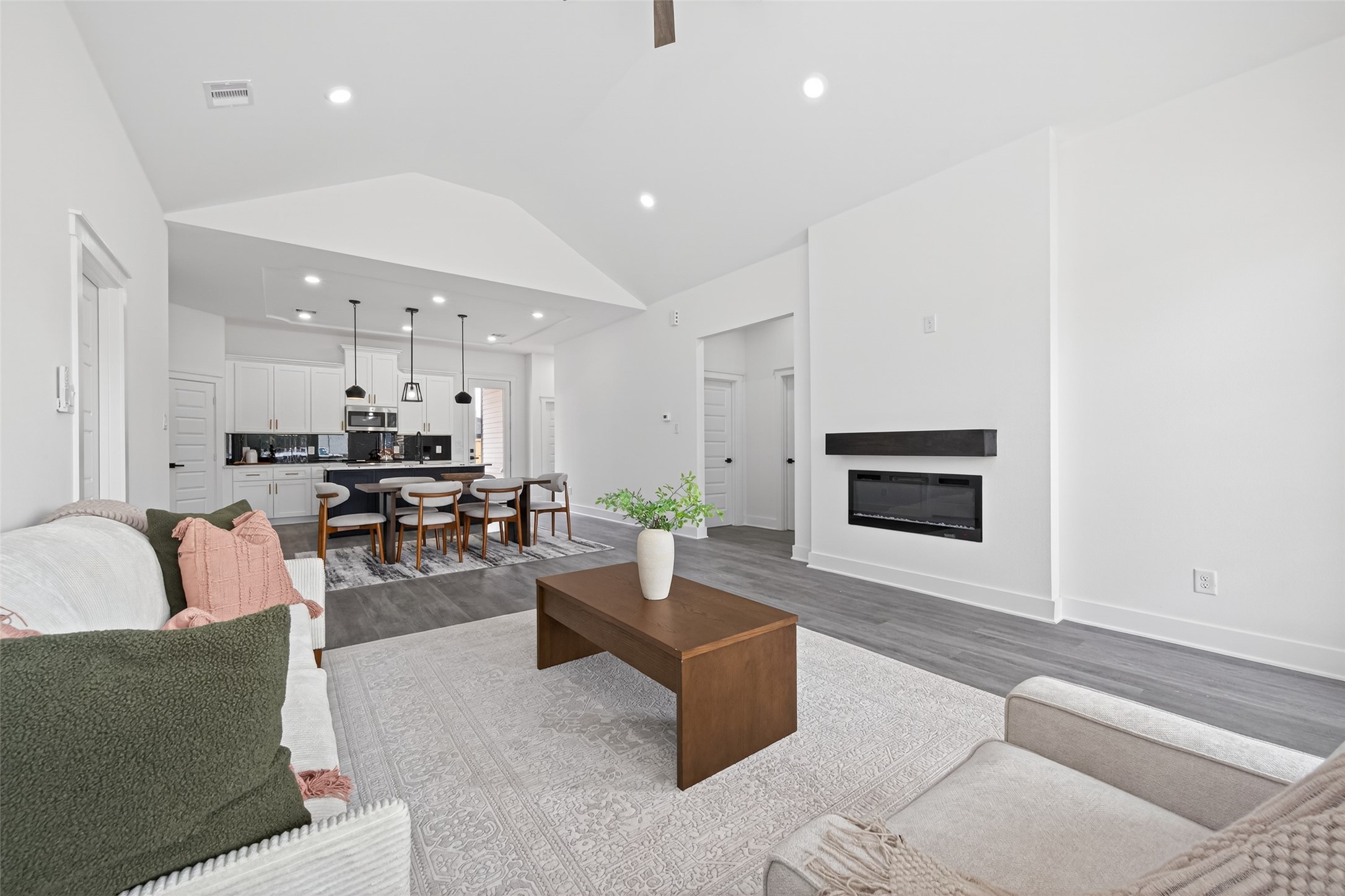 1129 Longleaf Pne Street Huffman, TX 77336 - Photo 6 of 35 a living room with furniture and a fireplace