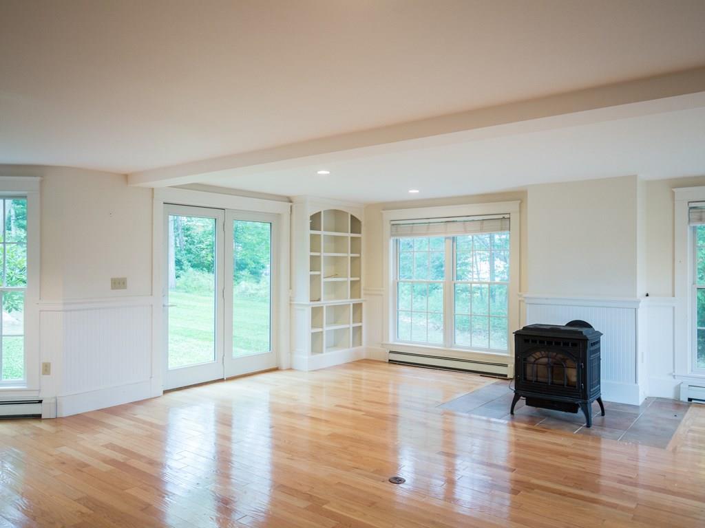 866 Princes Point Road Yarmouth, ME 04096 - Photo 7 of 27 Pellet stove makes a great center...