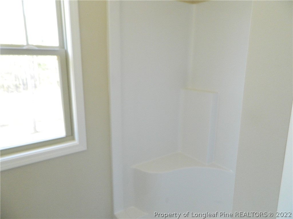 22 Raintree Lane Spring Lake, NC 28390 - Photo 21 of 33 a bathroom with a bathtub