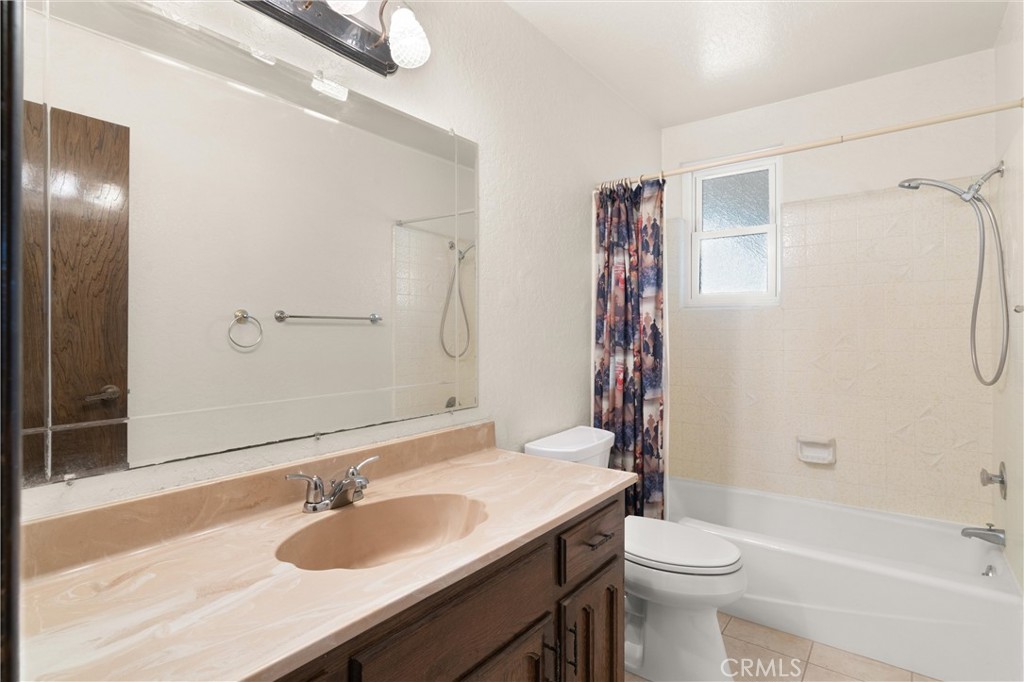 3518 Chestnut Drive Norco, CA 92860 - Photo 14 of 38 a bathroom with a sink a toilet and shower