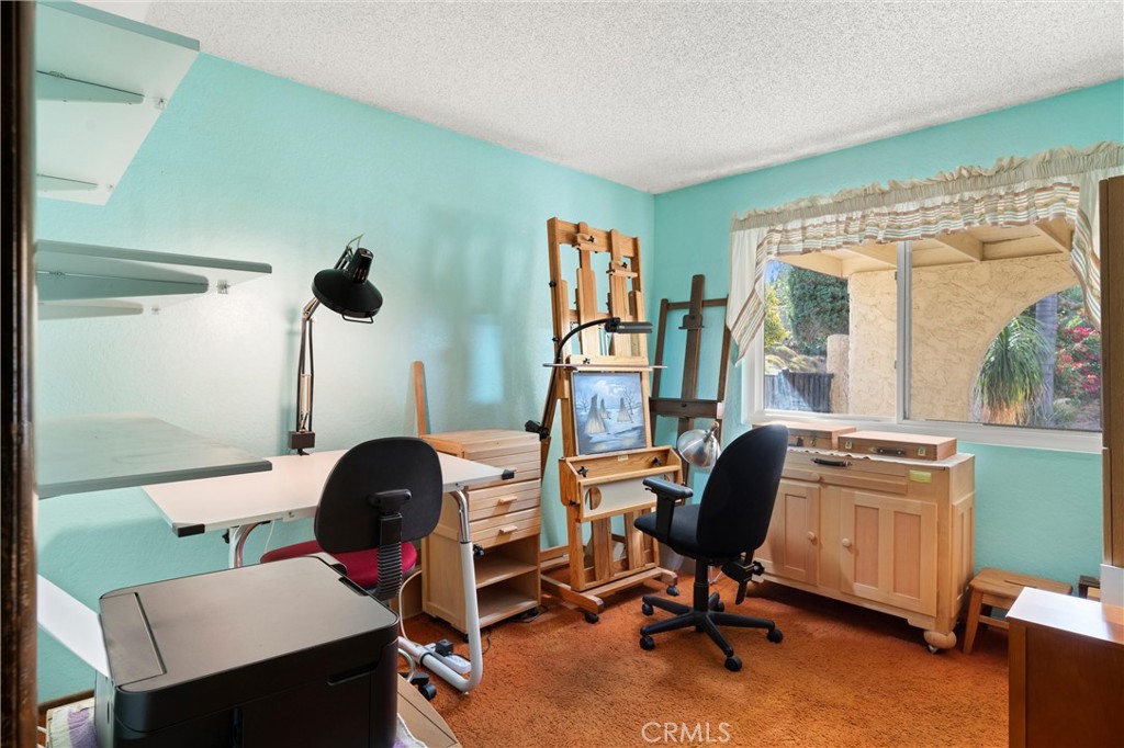 3518 Chestnut Drive Norco, CA 92860 - Photo 16 of 38 a view of a workspace with furniture and a window