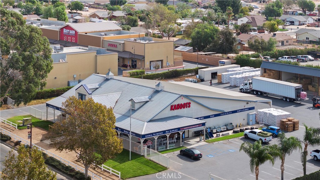 3518 Chestnut Drive Norco, CA 92860 - Photo 35 of 38 an aerial view of a house with swimming pool and seating area