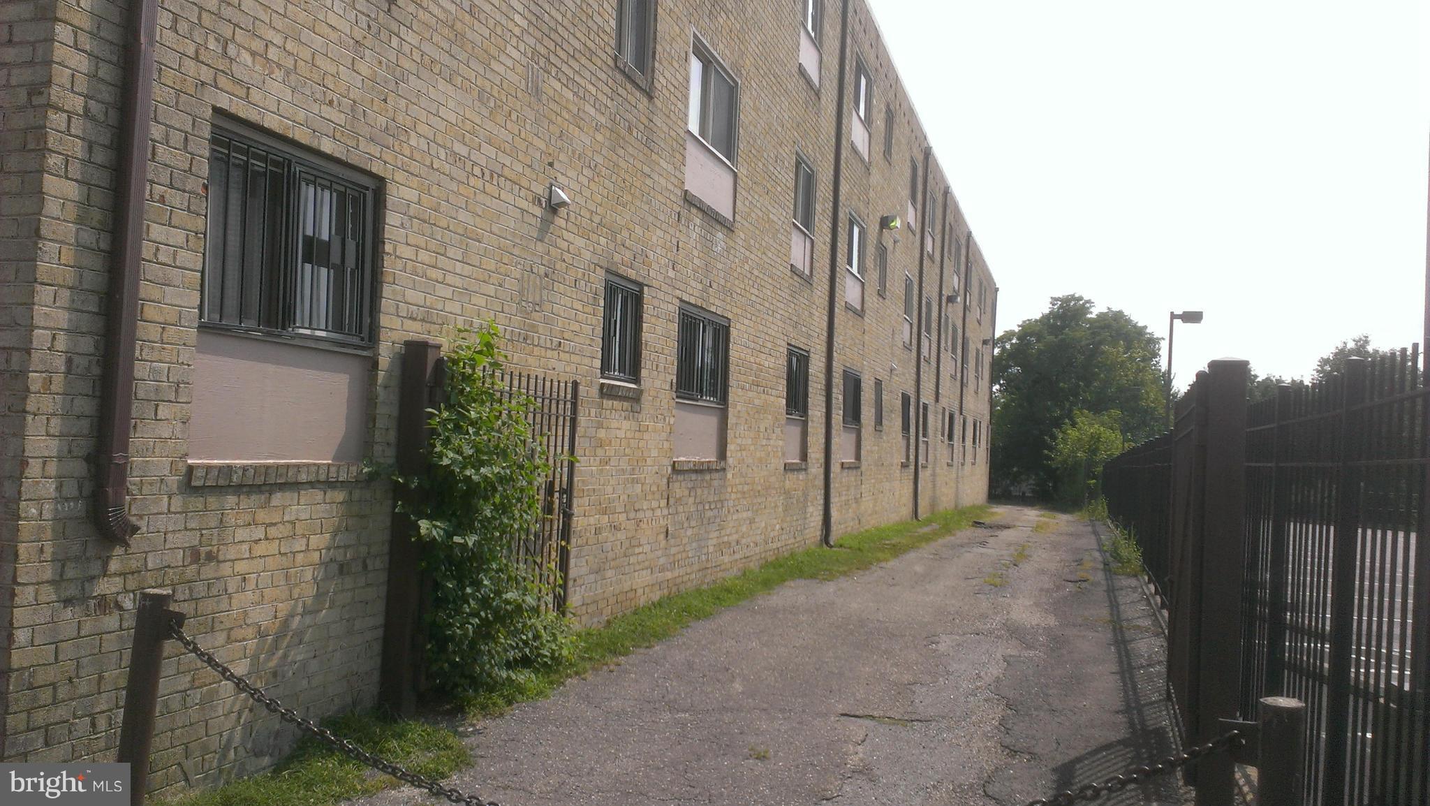 2435 Ainger Place Southeast Washington, DC 20020 - Photo 2 of 2 a view of a back yard of the house