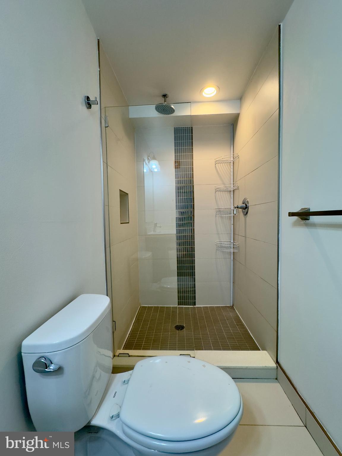 613 Portland Street, Unit 11 Baltimore, MD 21230 - Photo 9 of 9 a bathroom with a toilet and a shower