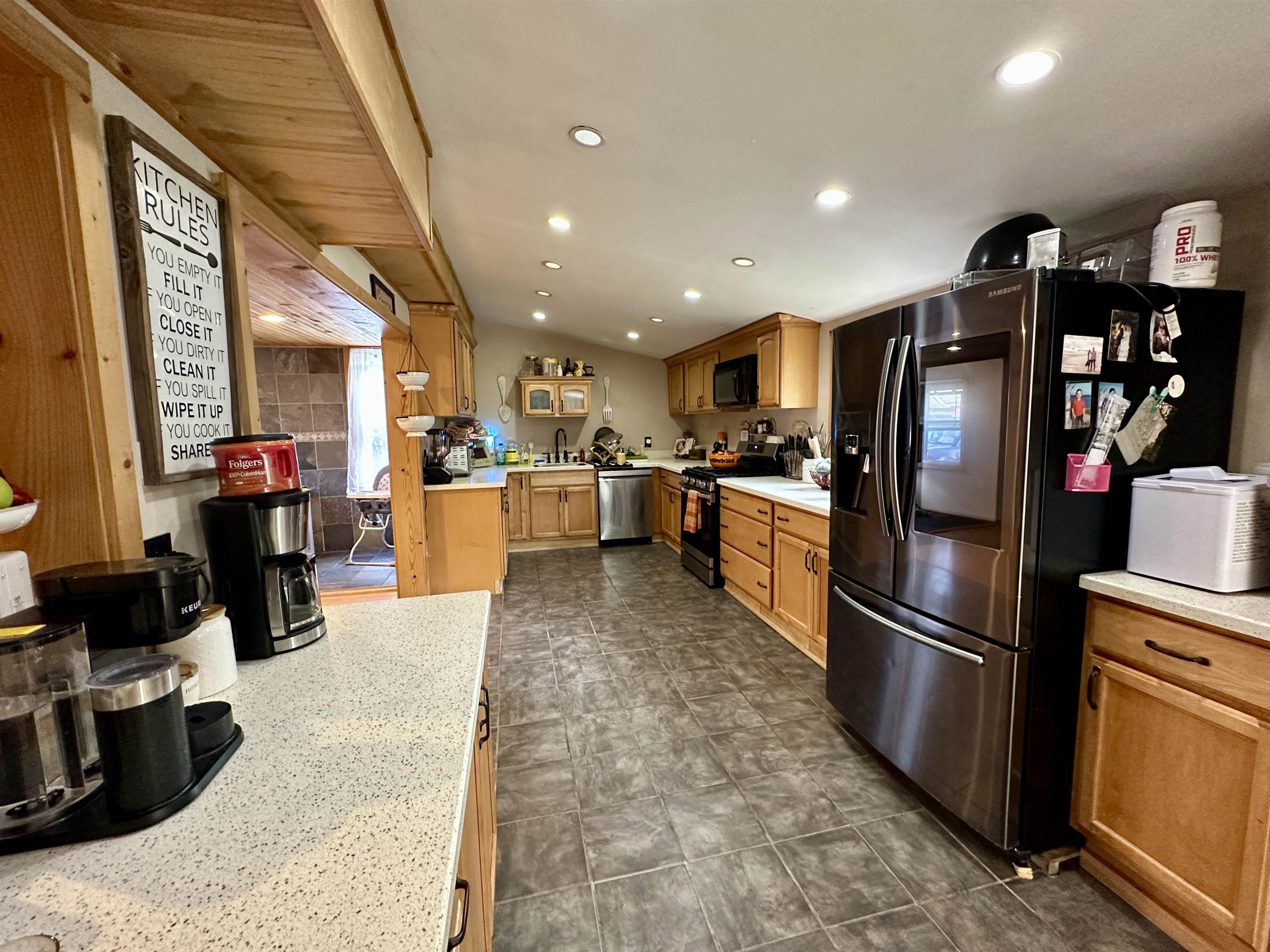 1062 Hansey Creek Road Port Norris, NJ 08349 - Photo 8 of 19 a kitchen with stainless steel appliances granite countertop a refrigerator stove top oven and sink