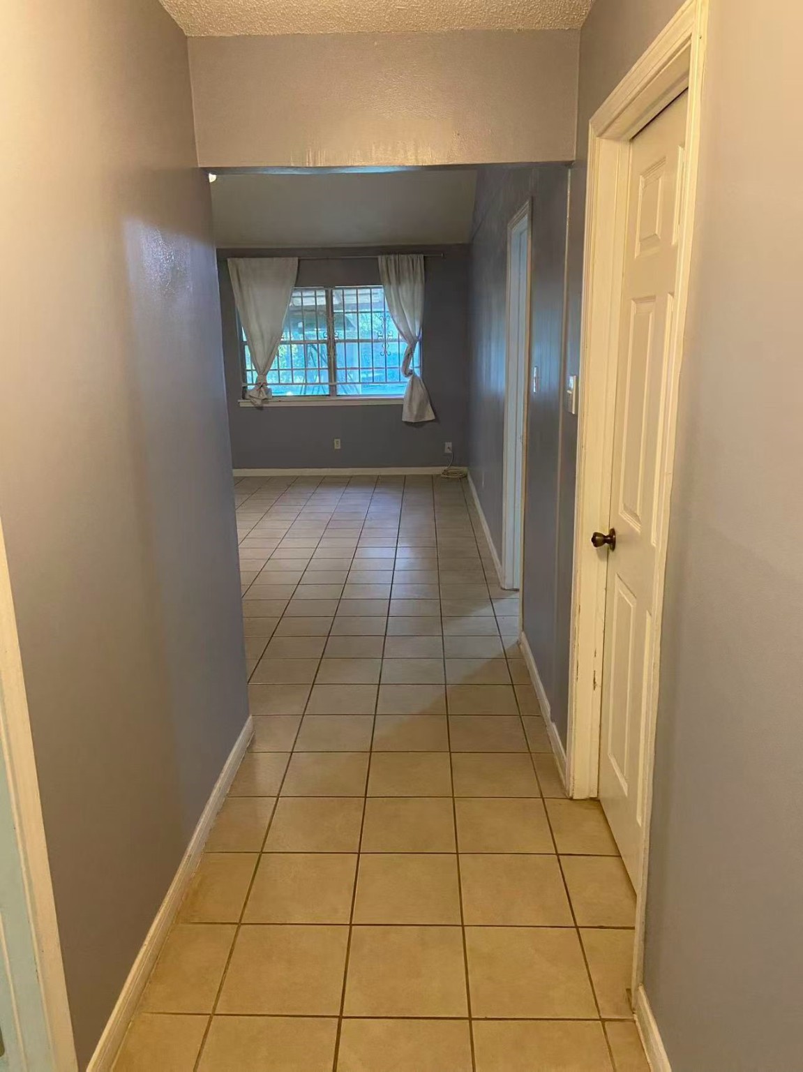 8911 Mobud Drive Houston, TX 77036 - Photo 3 of 8 a view of an entryway of a house