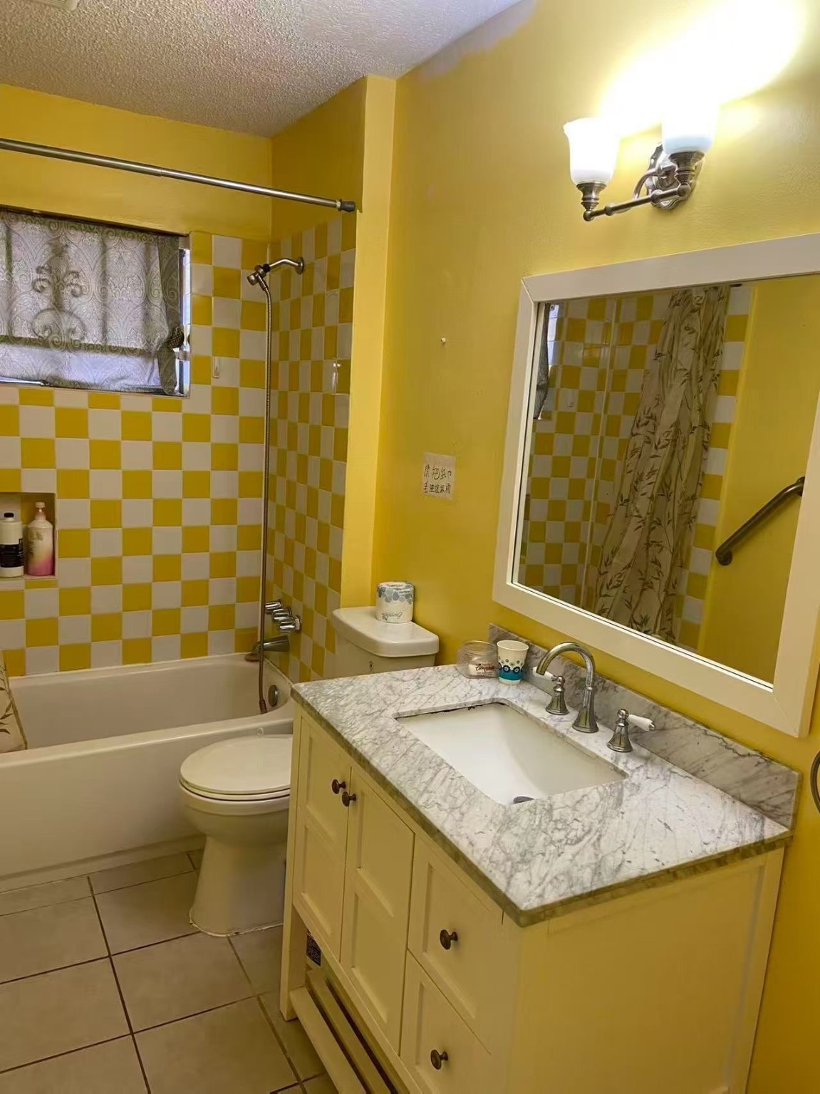 8911 Mobud Drive Houston, TX 77036 - Photo 8 of 8 a bathroom with a granite countertop sink toilet and shower