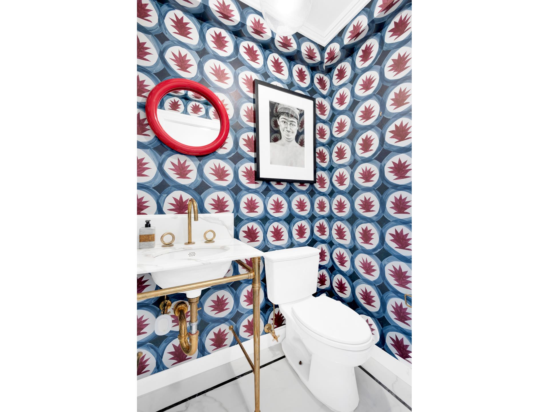 3 East 71st Street, Unit 10/11B Manhattan, NY 10021 - Photo 15 of 17 a bathroom with a toilet and a shower curtain