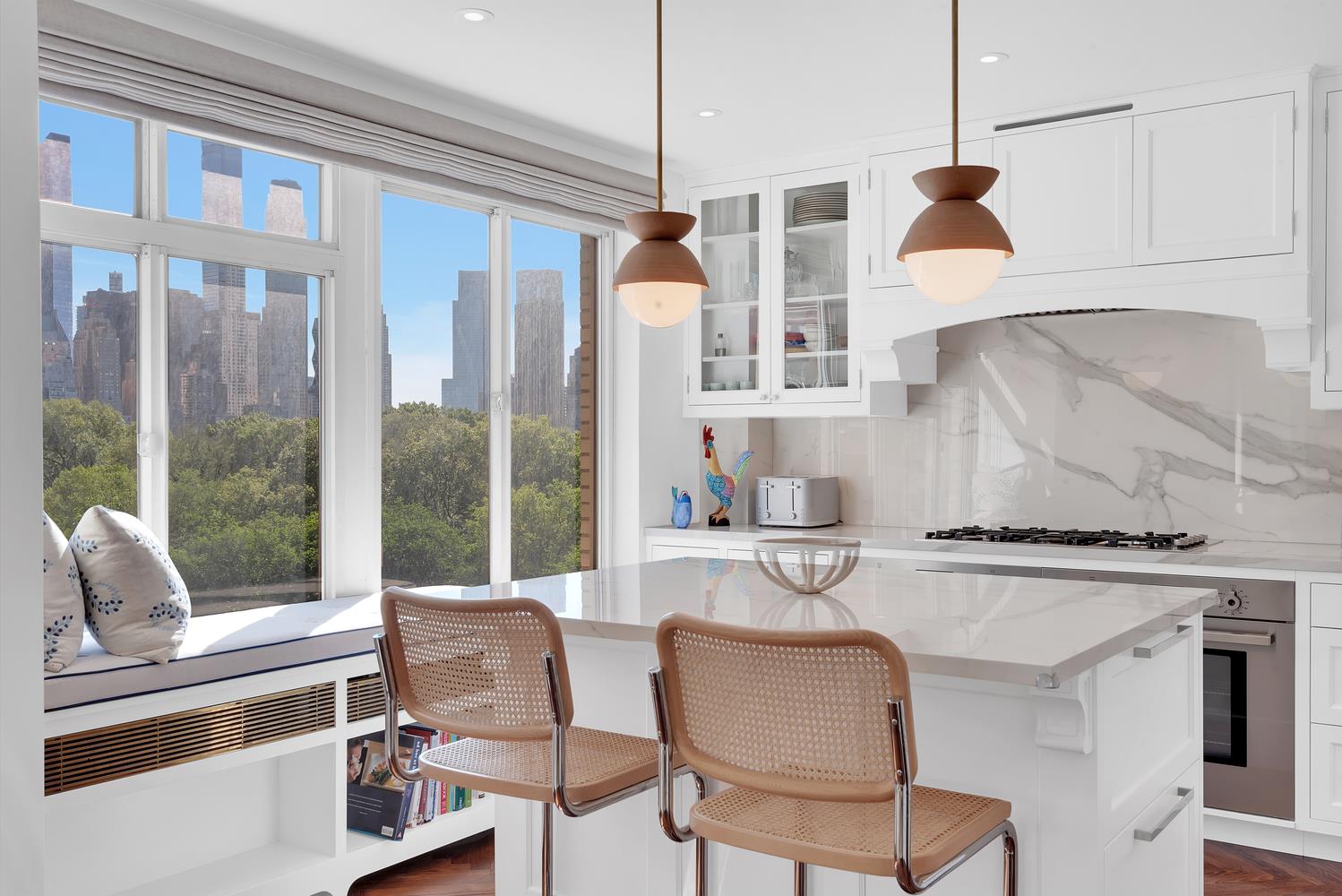3 East 71st Street, Unit 10/11B Manhattan, NY 10021 - Photo 6 of 17 a dining room with furniture and a floor to ceiling window