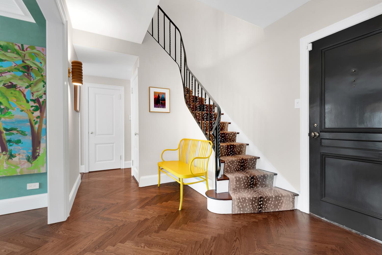 3 East 71st Street, Unit 10/11B Manhattan, NY 10021 - Photo 7 of 17 a view of entryway and hall with wooden floor
