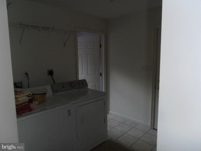 3065 Cox Road Chesapeake Beach, MD 20732 - Photo 5 of 17 a bathroom with a sink and a mirror