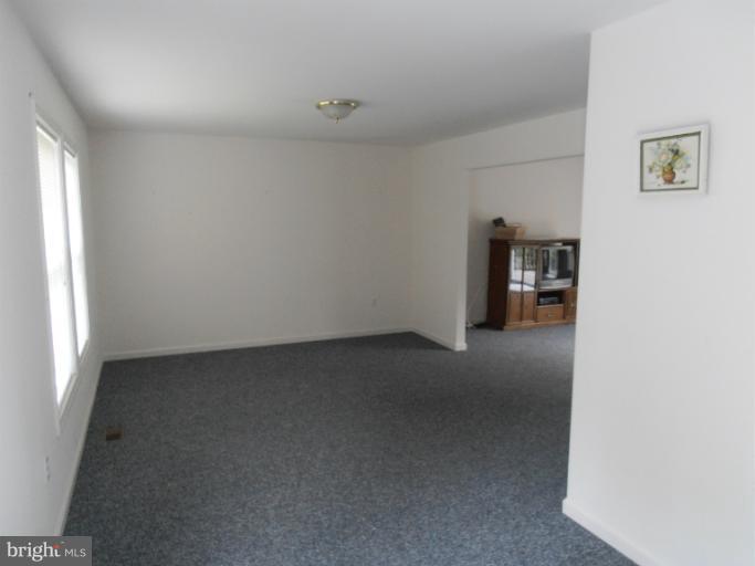 3065 Cox Road Chesapeake Beach, MD 20732 - Photo 8 of 17 a view of a room that has a window