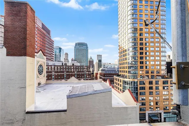 a view of buildings with outdoor space