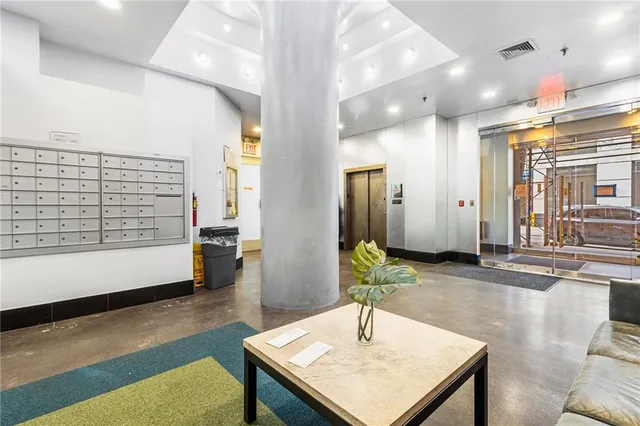 a living room with furniture and a table